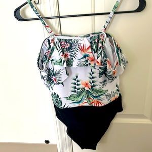 Floral one piece swimsuit with black bottoms from Shein size 13-14 years old